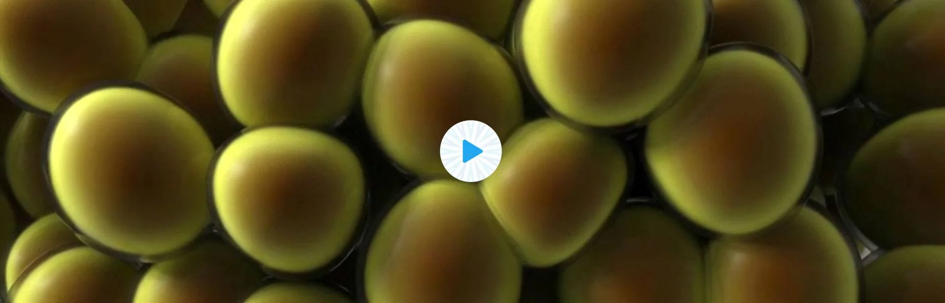 Close-up illustration of fat cells with a play button for CoolSculpting fat freezing in London